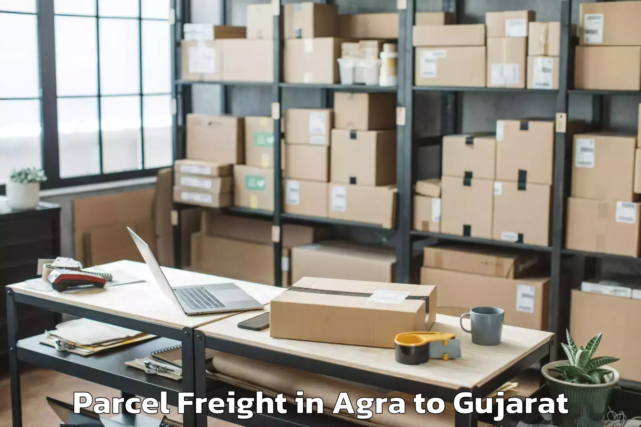 Easy Agra to Gussar Parcel Freight Booking